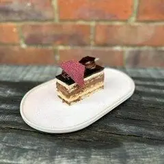 LIMITED EDITION VALENTINE CAKE!
The Opera Cake has layers of almond sponge, soaked in coffee syrup, layered with ganache and coffee, topped with a chocolate glaze made by the clever bakers at @the_street_bakeshop 
If you would like a special treat for your Valentine come and see us on Friday or drop us a message to reserve yours! Limited edition.
.
.

#organicallyspeaking #hartleywintney #supportsmall #valentinescake #limitededition #valentinestreat